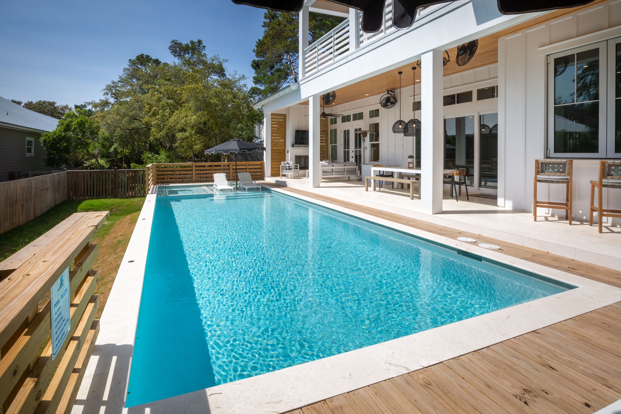 Front exterior with screened community pool